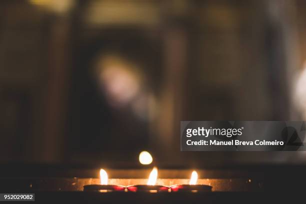 group of burning candles - vigil stock pictures, royalty-free photos & images