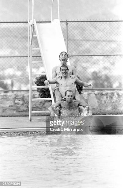 England footballers top to bottom: Terry Butcher, Kenny Sansom and Ray Wilkins slides into the swimming pool at the Cima Club in Monterrey, Mexico...