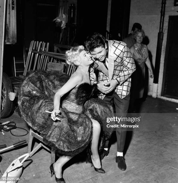 Cliff Richard with his co-star Yolande Donlan on the set of the film Expresso Bongo, 27th July 1959.