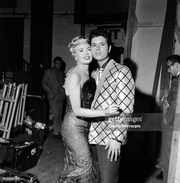 Cliff Richard with his co-star Yolande Donlan on the set of the film Expresso Bongo, 27th July 1959.