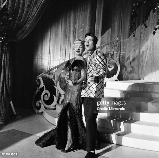 Cliff Richard with his co-star Yolande Donlan on the set of the film Expresso Bongo, 27th July 1959.