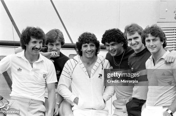 England footballers in relaxed mood at the team hotel during the 1982 World Cup Finals in Spain. Left to right: Terry McDermott, unidentified, Kevin...