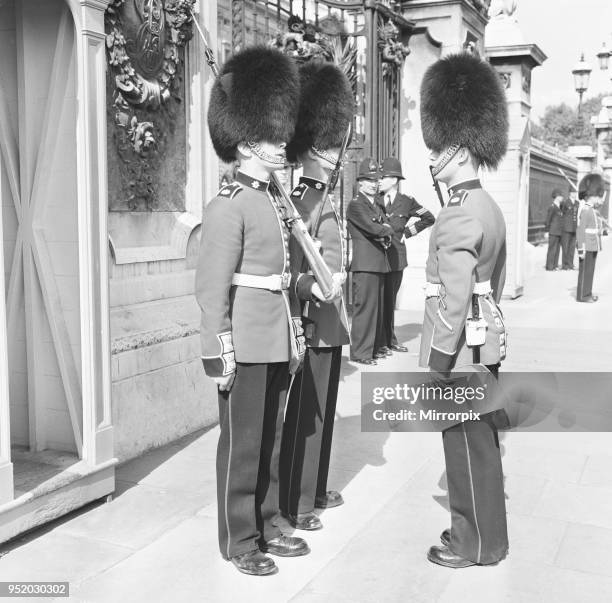 The Coldstream guards seen here being given their order before mounting the guard at Buckingham Palace, 1st September 1959.