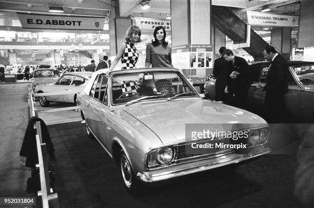 Models posing in this soft top Ford Consul at the London Motor Show 18th October 1966. The soft top is in fact a Ford Cortina Mk2, and not a Consul...