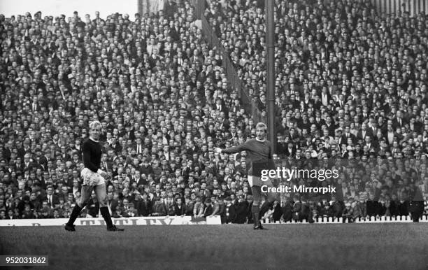 Manchester United v Arsenal - October 1967 Denis Law of Manchester United and Ian Ure of Arsenal are sent off by referee George McCabe 7th October...