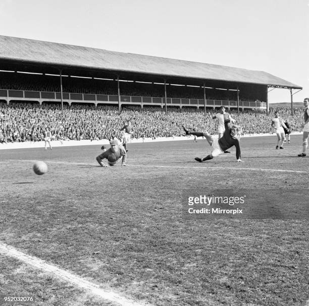 Blackburn Rovers v Manchester United, league match at Ewood Park, Saturday 3rd April 1965. Keeper Fred Else watches the ball from Denis Law, just...