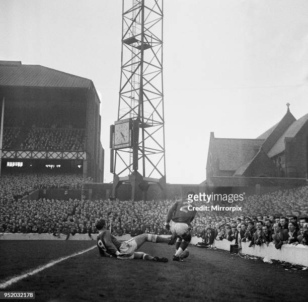 English League Division One match at Goodison Park. Everton 3 v Liverpool 1. Jimmy Gabriel of Everton gives Gerry Byrne a kick where it hurts as the...