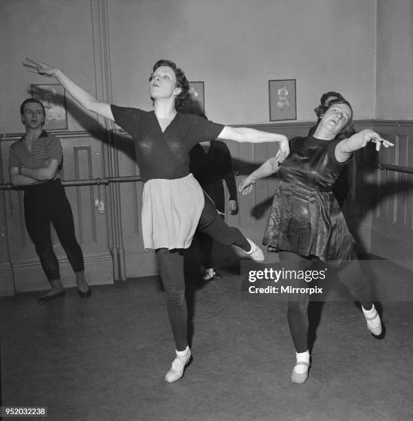 Life in the Mirror Side by side, housewife Mary Batten left and telephonist Grace Salvat practise their ballet dancing. They are just two of many...