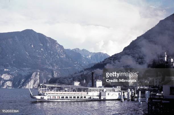 The paddle steamer Sempione arrives at Gandria Village, Lake Lugano, Switzerland July 1938.