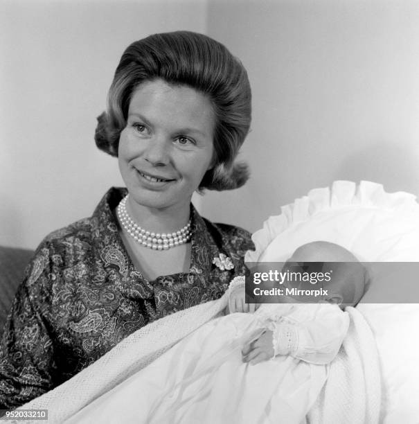 The Duchess of Kent with her baby son, the Earl of St Andrews at her home Coppins in Iver, Buckinghamshire, 16th July 1962.