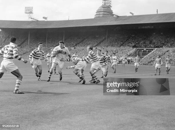 Halifax try to stem a St Helens attack during the Rugby League Cup Final at Wembley, 28th April 1956.