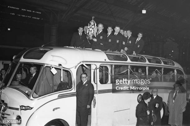 Alan Prescott holds the Rugby League Cup aloft as the St Helens team arrive at the Town Hall for a civic reception to celebrate their 13-2 victory...