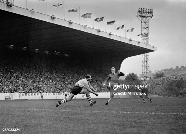 English League Division One match at Hillsborough. Sheffield Wednesday 1 v Manchester United 0. United's Denis Law tries to take the ball past...