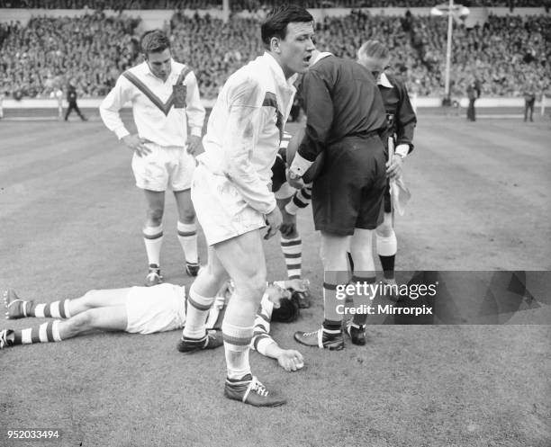 Wigan full back Bolton lies on the ground concussed after the half time whistle had blown, during the Rugby League Cup Final against Wakefield...