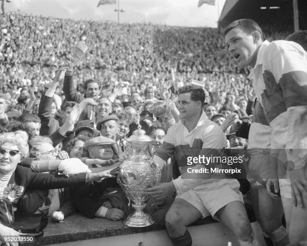 Derek Turner of Wakefield Trinity shows the trophy to fans after their 25 - 10 victory over Wigan during the Rugby League Cup Final at Wembley, 11th...
