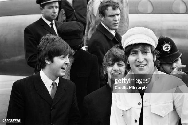 The Beatles at London Heathrow Airport. The Beatles returned home after a successful european tour of France, Italy & finally Spain. Paul McCartney,...