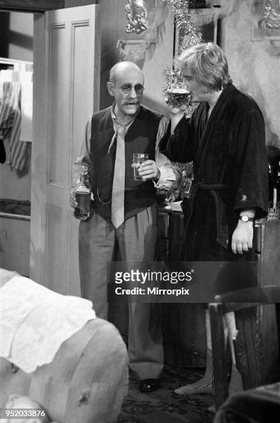 Rehearsals for a Christmas special of 'Till Death Us Do Part'. Pictured, Warren Mitchell as Alf Garnett and Antony Booth as Mike Rawlins, 11th...