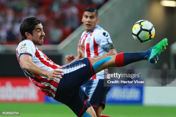 Rodolfo Pizarro of Chivas kicks the ball during the second leg match of the final between Chivas and Toronto FC as part of CONCACAF Champions League...