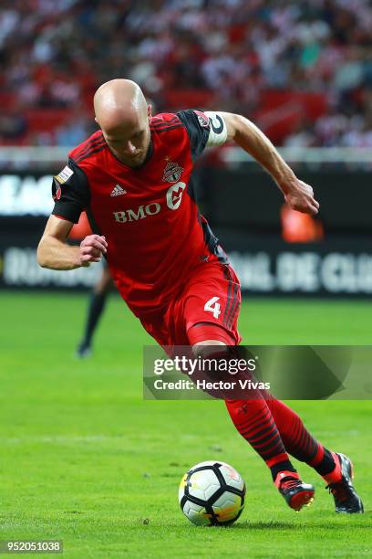 Michael Bradley of Toronto FC drives the ball during the second leg match of the final between Chivas and Toronto FC as part of CONCACAF Champions...