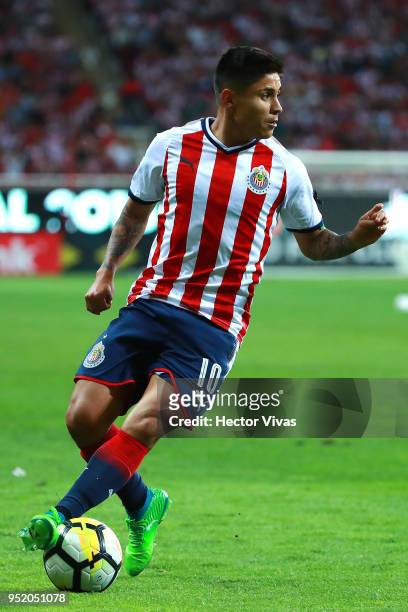 Javier Lopez of Chivas drives the ball during the second leg match of the final between Chivas and Toronto FC as part of CONCACAF Champions League...