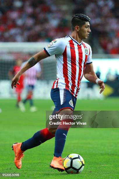 Alan Pulido of Chivas drives the ball during the second leg match of the final between Chivas and Toronto FC as part of CONCACAF Champions League...