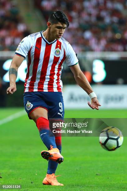 Alan Pulido of Chivas drives the ball during the second leg match of the final between Chivas and Toronto FC as part of CONCACAF Champions League...