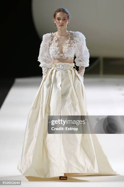 Model walks the runway during the Yolan Cris show as part of the Barcelona Bridal Week 2018 on April 26, 2018 in Barcelona, Spain.