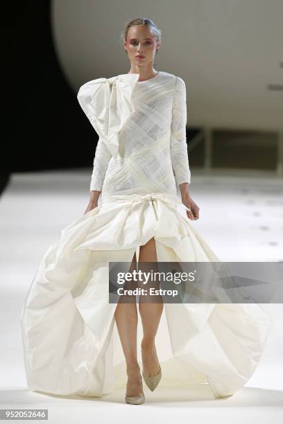 Model walks the runway during the Yolan Cris show as part of the Barcelona Bridal Week 2018 on April 26, 2018 in Barcelona, Spain.