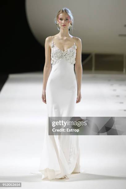 Model walks the runway during the Yolan Cris show as part of the Barcelona Bridal Week 2018 on April 26, 2018 in Barcelona, Spain.