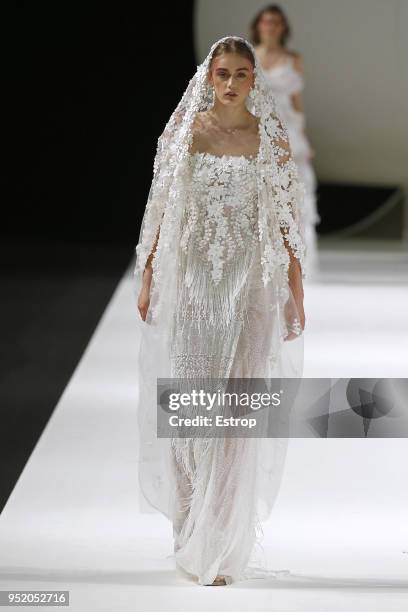 Model walks the runway during the Yolan Cris show as part of the Barcelona Bridal Week 2018 on April 26, 2018 in Barcelona, Spain.