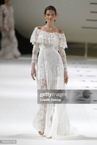 Model walks the runway during the Yolan Cris show as part of the Barcelona Bridal Week 2018 on April 26, 2018 in Barcelona, Spain.