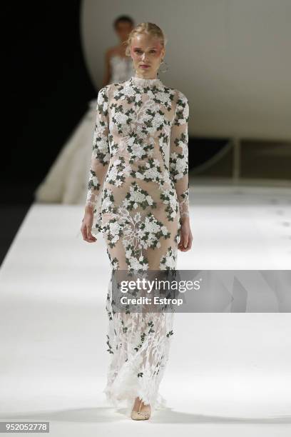 Model walks the runway during the Yolan Cris show as part of the Barcelona Bridal Week 2018 on April 26, 2018 in Barcelona, Spain.