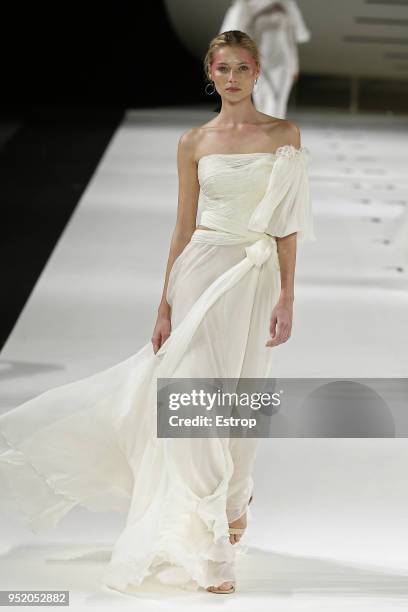 Model walks the runway during the Yolan Cris show as part of the Barcelona Bridal Week 2018 on April 26, 2018 in Barcelona, Spain.