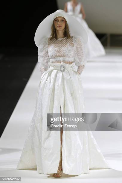 Model walks the runway during the Yolan Cris show as part of the Barcelona Bridal Week 2018 on April 26, 2018 in Barcelona, Spain.