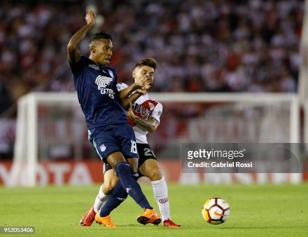 Gonzalo Montiel of River Plate fights for the ball with Eduar Preciado of Emelec during a match between River Plate and Emelec as part of Copa...