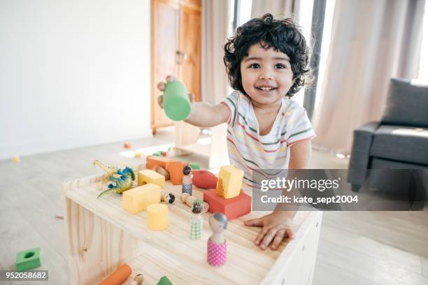 teaching a child how to share - toddler playing stock pictures, royalty-free photos & images