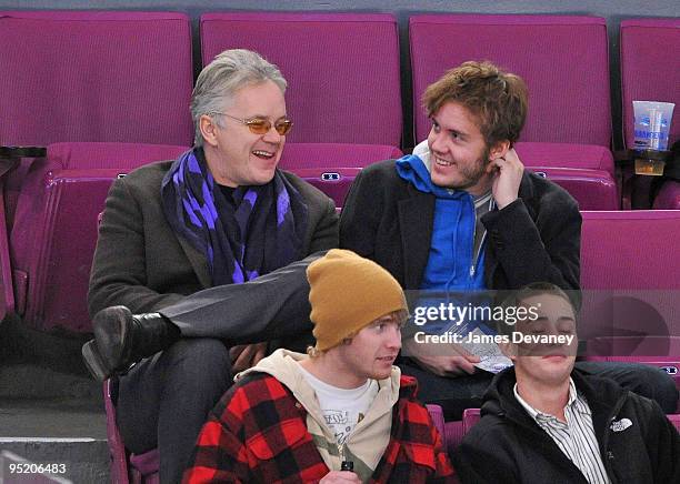 Tim Robbins and his son attend the Florida Panthers vs New York Rangers game at Madison Square Garden on December 23, 2009 in New York City.