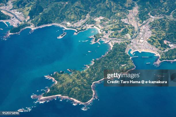 northern pacific ocean and tosashimizu city in kochi prefecture in japan daytime aerial view from airplane - préfecture de kochi photos et images de collection