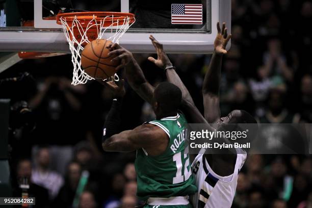 Terry Rozier of the Boston Celtics attempts a shot while being guarded by Thon Maker of the Milwaukee Bucks in the third quarter during Game Six of...