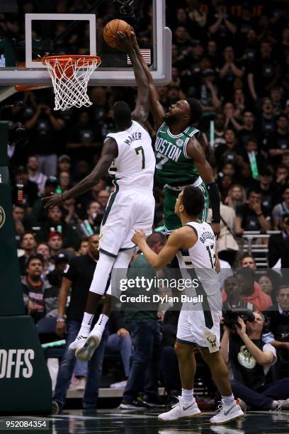 Thon Maker of the Milwaukee Bucks blocks a shot attempt by Jaylen Brown of the Boston Celtics in the third quarter during Game Six of Round One of...