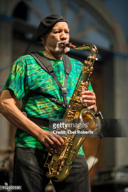 Charles Neville performs with Aaron Neville at the New Orleans Jazz and Heritage Festival at the Fair Grounds Race Course in New Orleans, Louisiana...