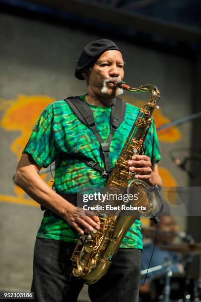 Charles Neville performs with Aaron Neville at the New Orleans Jazz and Heritage Festival at the Fair Grounds Race Course in New Orleans, Louisiana...