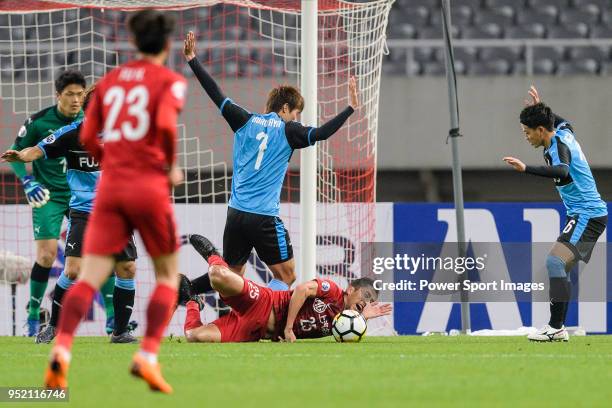 Shanghai FC Midfielder Odil Akhmedov battles for the ball with Kawasaki defender Kurumaya Shintaro during the AFC Champions League 2018 Group Stage F...