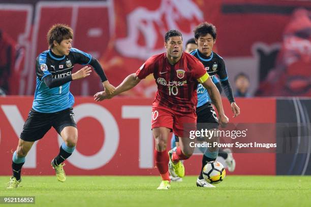 Shanghai FC Forward Givanildo Vieira de Sousa fights for the ball with Kawasaki defender Kurumaya Shintaro during the AFC Champions League 2018 Group...