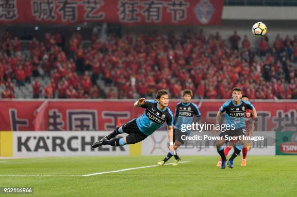 Tatsuki Nara of Kawasaki Frontale heads the ball during the AFC Champions League 2018 Group Stage F Match Day 5 between Shanghai SIPG and Kawasaki...