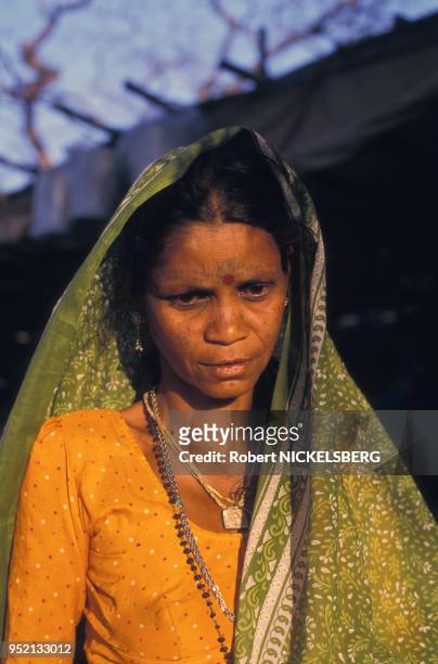 Femme d'une tribu hindoue avec des tatouages sur le visage en février 1999 à Ahwa en Inde.