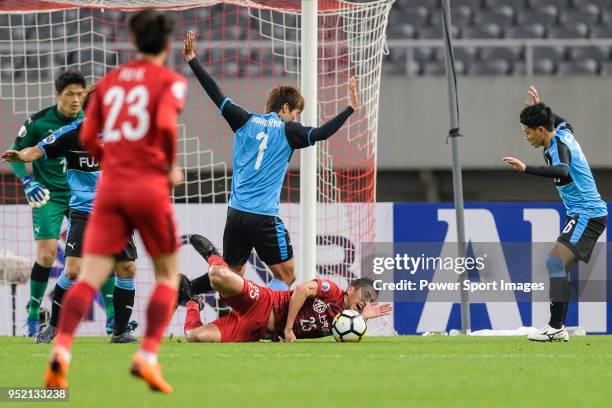 Shanghai FC Midfielder Odil Akhmedov battles for the ball with Kawasaki defender Kurumaya Shintaro during the AFC Champions League 2018 Group Stage F...