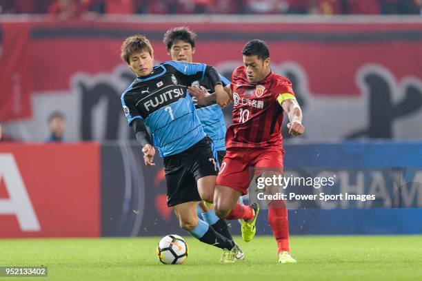 Shanghai FC Forward Givanildo Vieira de Sousa fights for the ball with Kawasaki defender Kurumaya Shintaro during the AFC Champions League 2018 Group...
