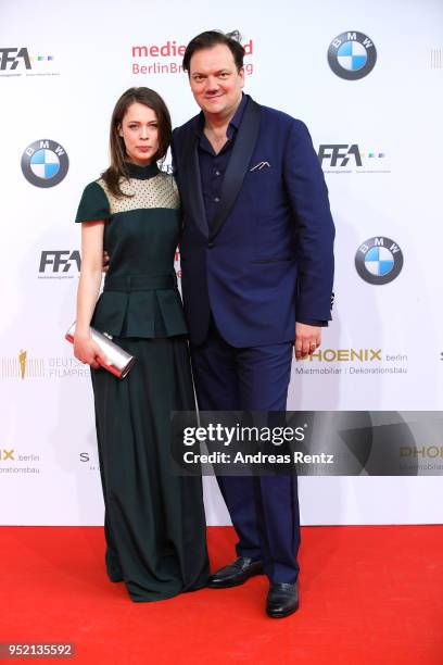 Paula Beer and Charly Huebner attend the Lola - German Film Award red carpet at Messe Berlin on April 27, 2018 in Berlin, Germany.