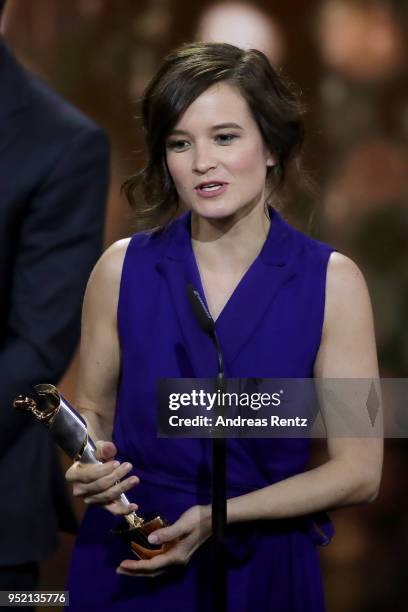 Producer Lena Schoemann accepts the award 'Biggest Movie Audience' for the film 'Fack ju Goehte' on stage during the Lola - German Film Award show at...
